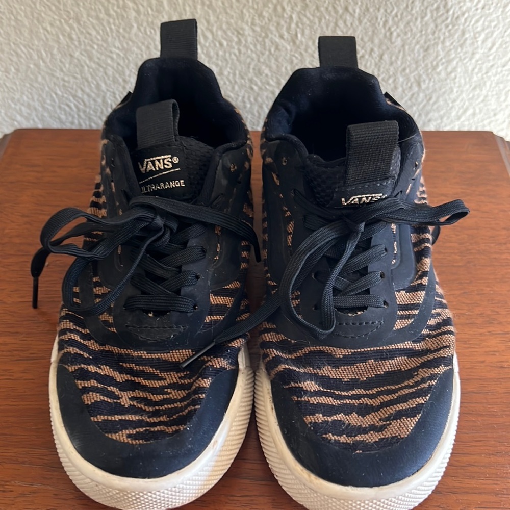 Vans. Athletic shoes. Tiger print. Size 6.5 women. Basically new.